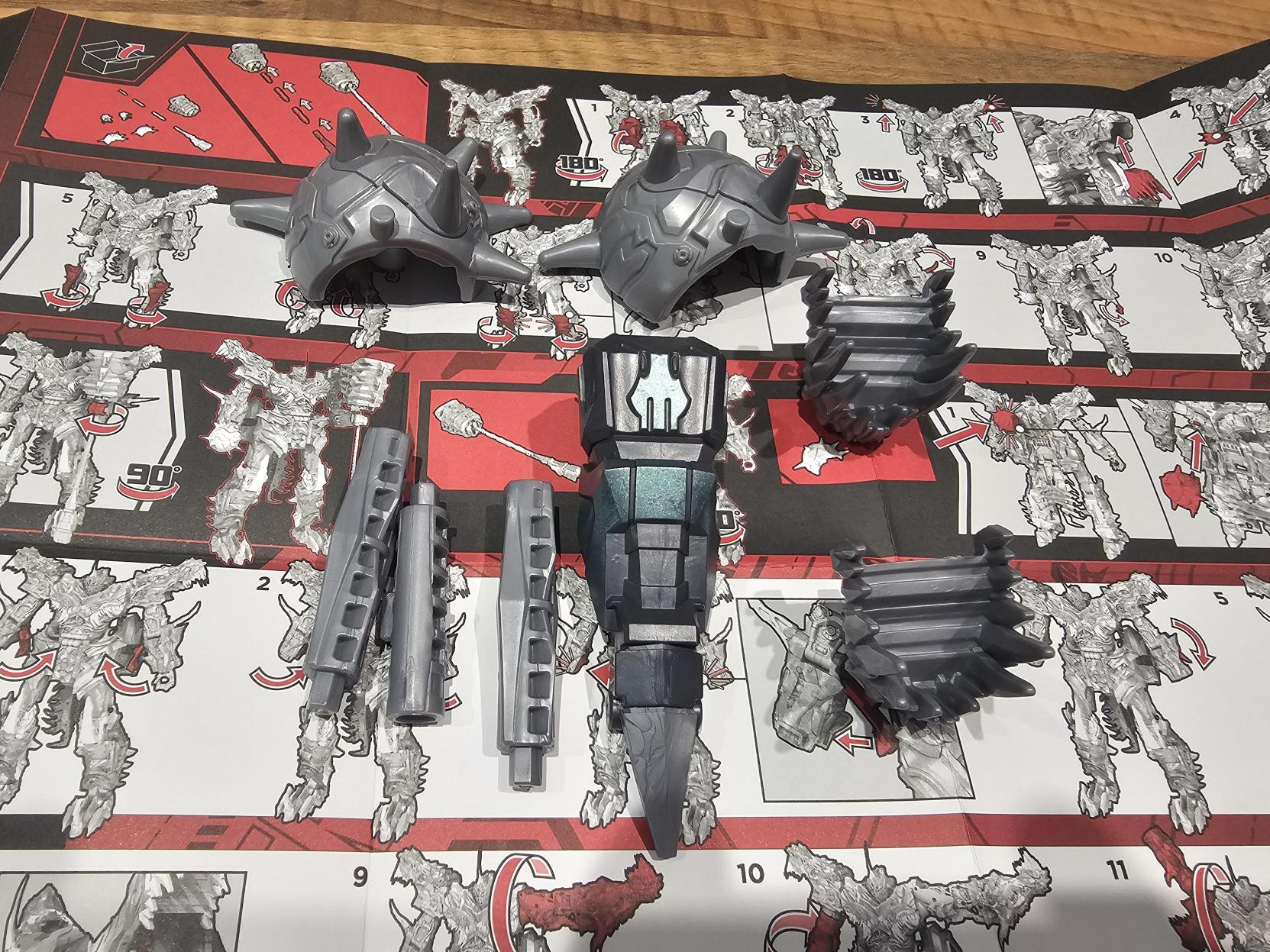 A picture of the remaining spare parts over the spread out transformation steps instructions